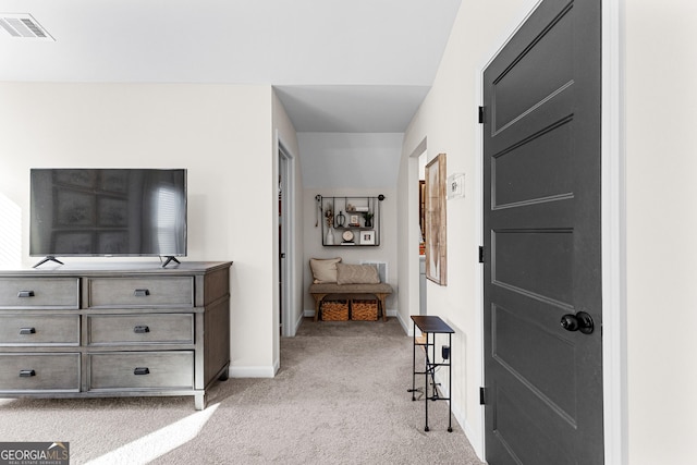 bedroom with light carpet