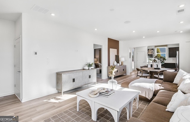 living room featuring light hardwood / wood-style floors