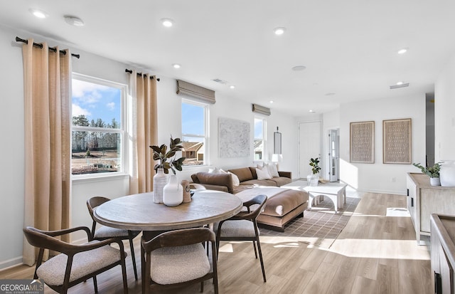 dining room featuring light hardwood / wood-style floors