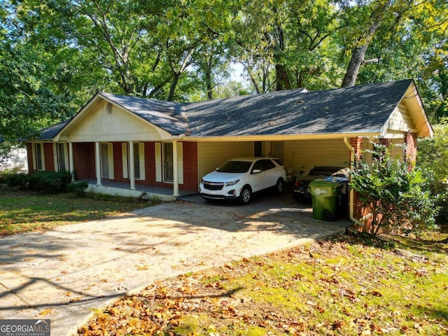 view of front facade featuring a carport and covered porch