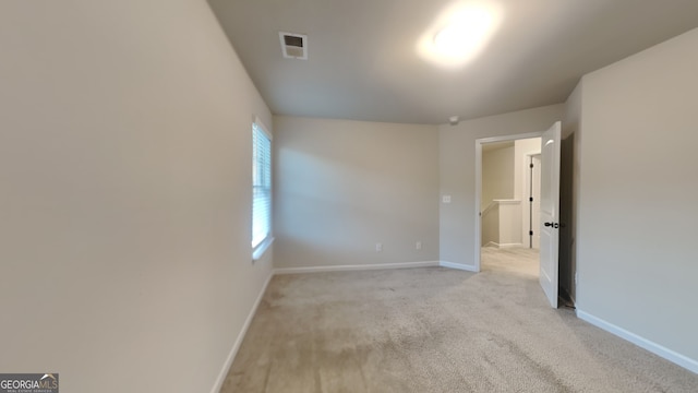 view of carpeted spare room