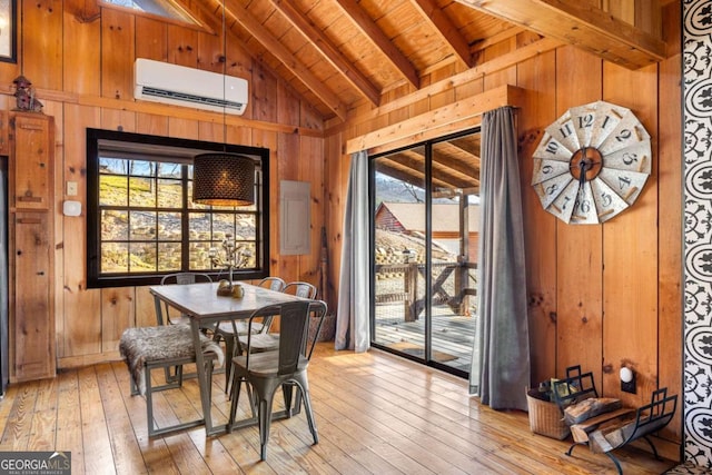 dining area with a wall unit AC, wood walls, wood ceiling, and beam ceiling