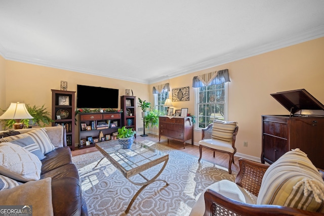 living room featuring light hardwood / wood-style flooring and ornamental molding