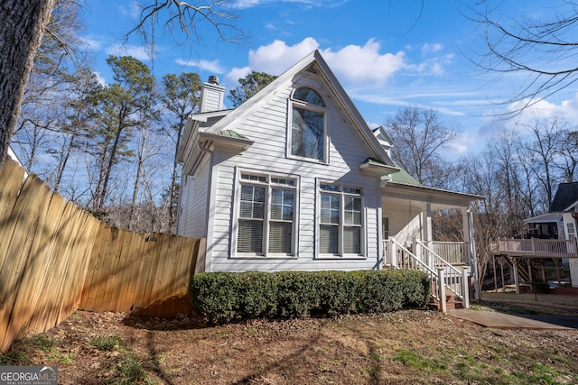 view of home's exterior featuring a porch