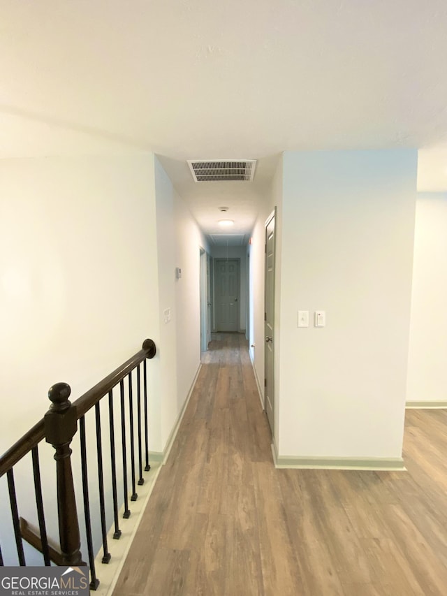 hallway featuring light hardwood / wood-style floors