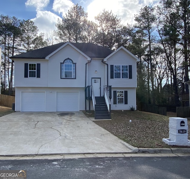 bi-level home featuring a garage