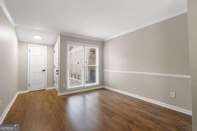 interior space with ornamental molding and dark wood-type flooring