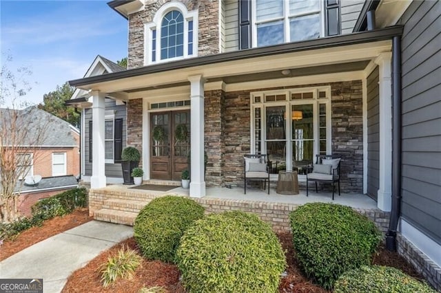 property entrance featuring a porch