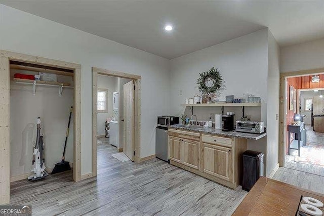 kitchen featuring light hardwood / wood-style floors and sink