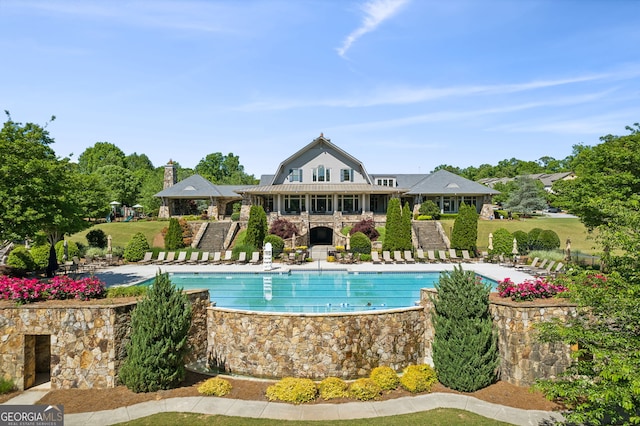 view of swimming pool featuring a gazebo