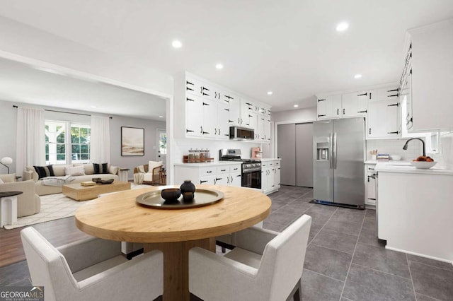 tiled dining space with sink