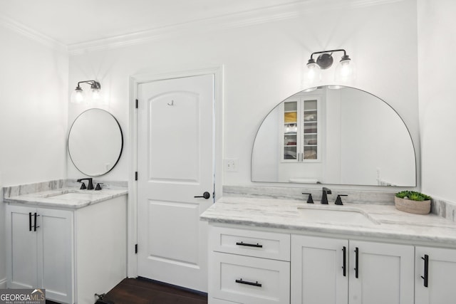 bathroom with vanity and crown molding