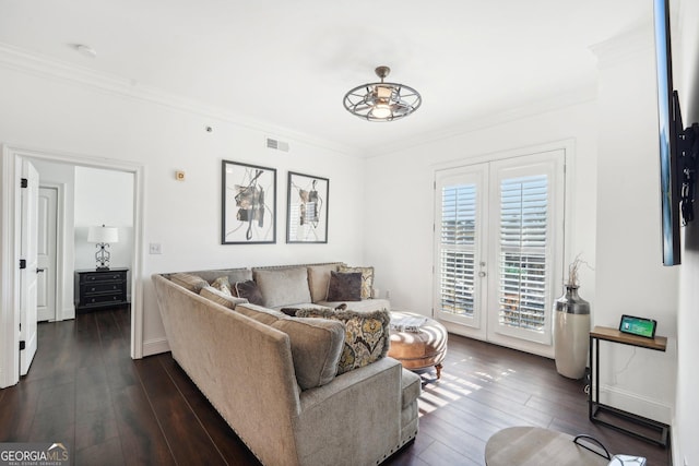 living room with french doors, dark hardwood / wood-style flooring, ceiling fan, and ornamental molding