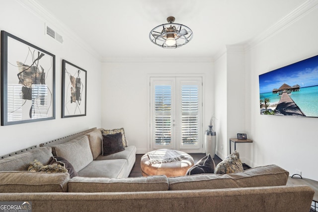 living room featuring french doors, ceiling fan, and ornamental molding