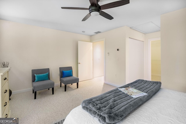 bedroom featuring ceiling fan, carpet floors, and a closet