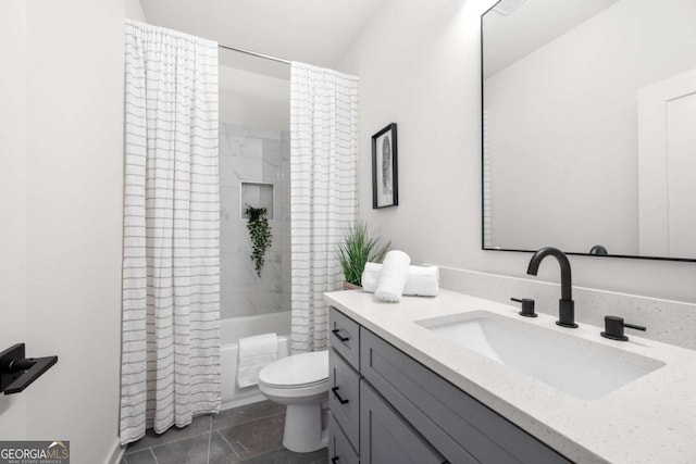 full bathroom featuring tile patterned floors, shower / bath combo, toilet, and vanity