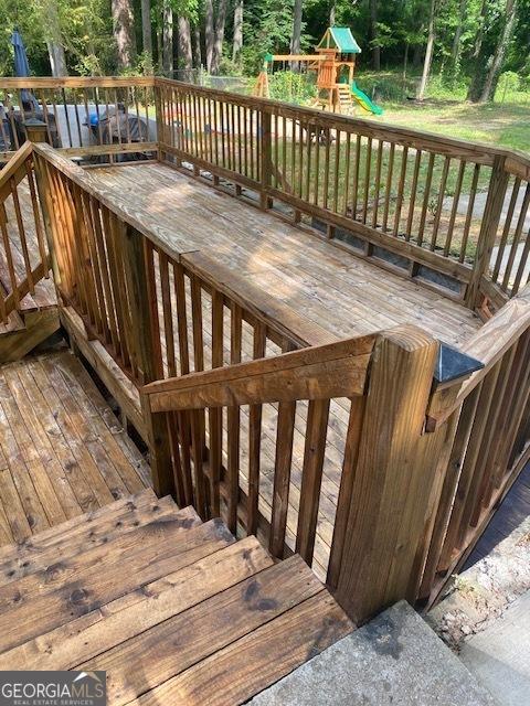 wooden deck with a playground