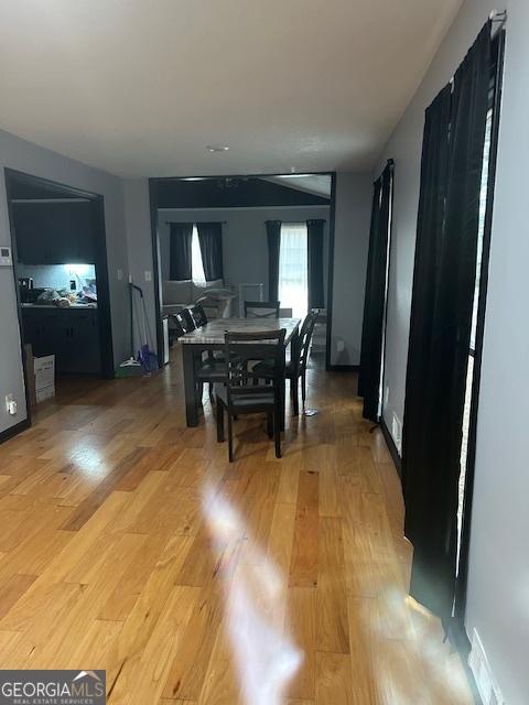 dining space featuring hardwood / wood-style floors