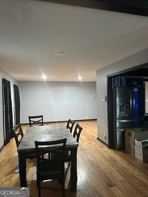 dining space featuring light hardwood / wood-style flooring