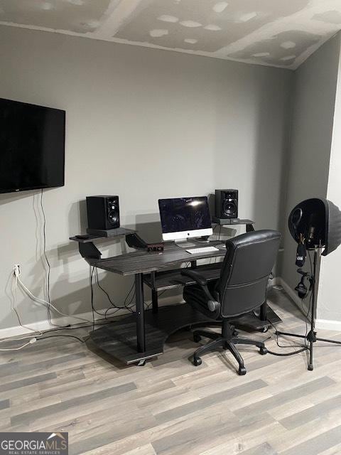 home office featuring light hardwood / wood-style flooring