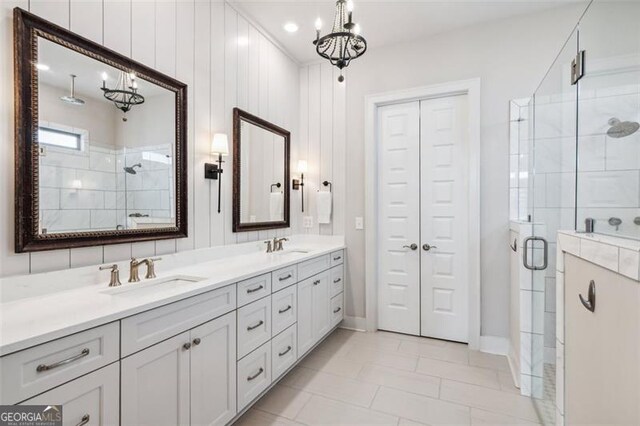 bedroom featuring dark wood-type flooring, crown molding, and a chandelier