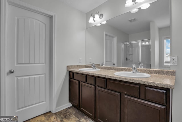 bathroom featuring vanity and walk in shower