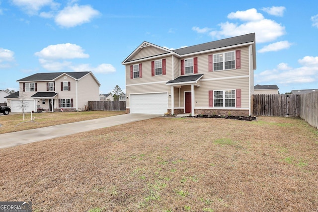 view of front property with a garage and a front lawn