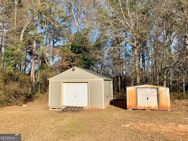 view of outbuilding with a garage