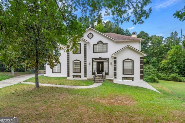 view of front of house with a front yard