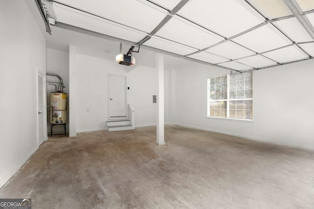 garage featuring a garage door opener and gas water heater