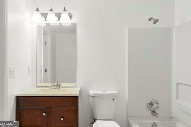 full bathroom featuring vanity, toilet, and shower / washtub combination