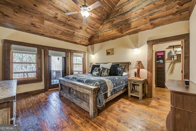 bedroom with ceiling fan, hardwood / wood-style floors, high vaulted ceiling, and wood ceiling