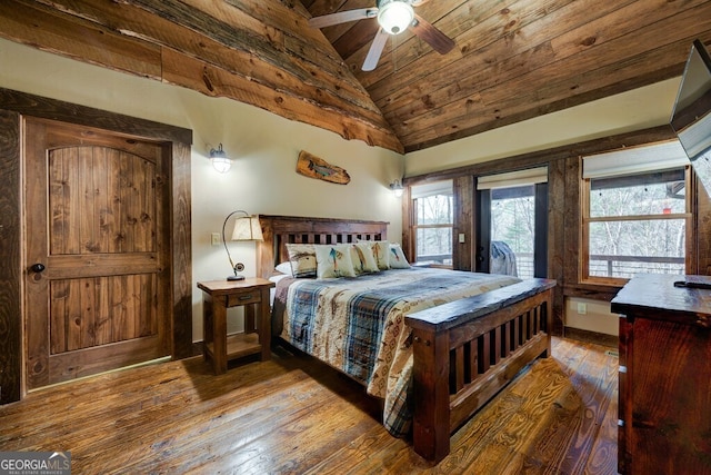 bedroom with ceiling fan, vaulted ceiling, hardwood / wood-style flooring, and wooden ceiling