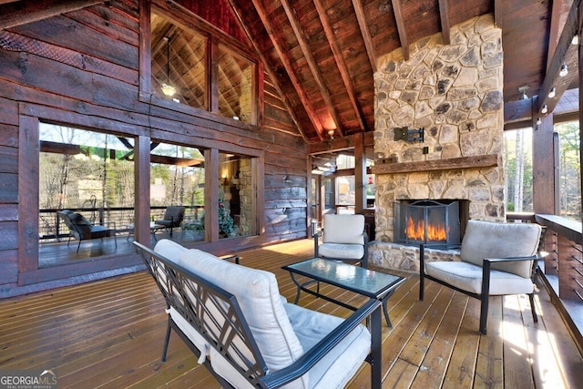 interior space with a stone fireplace