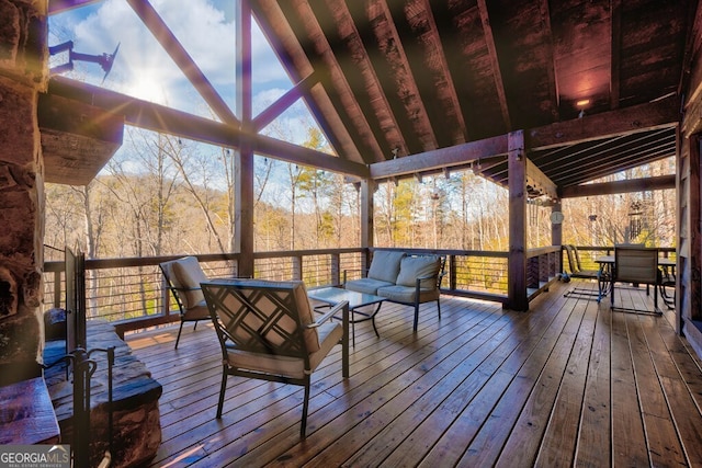 sunroom / solarium with lofted ceiling