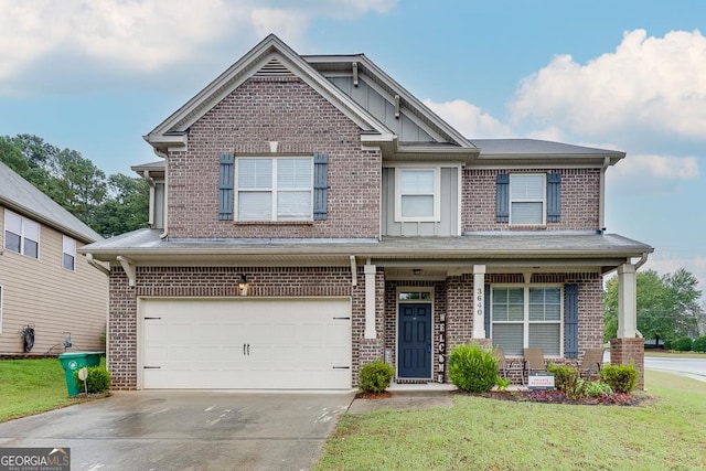 craftsman-style home featuring a front yard, a porch, and a garage