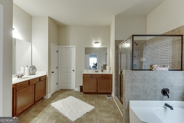 bathroom with plus walk in shower and vanity