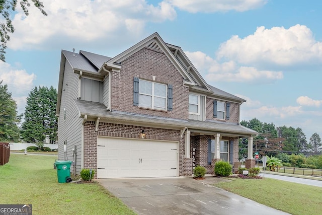 craftsman-style house with a garage and a front lawn