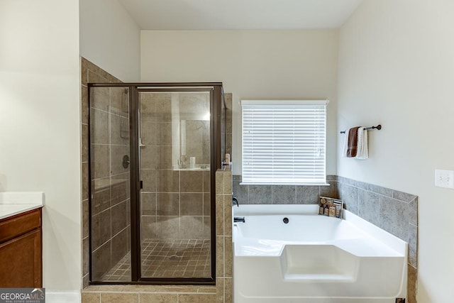 bathroom with vanity and plus walk in shower