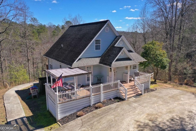 back of house with a porch