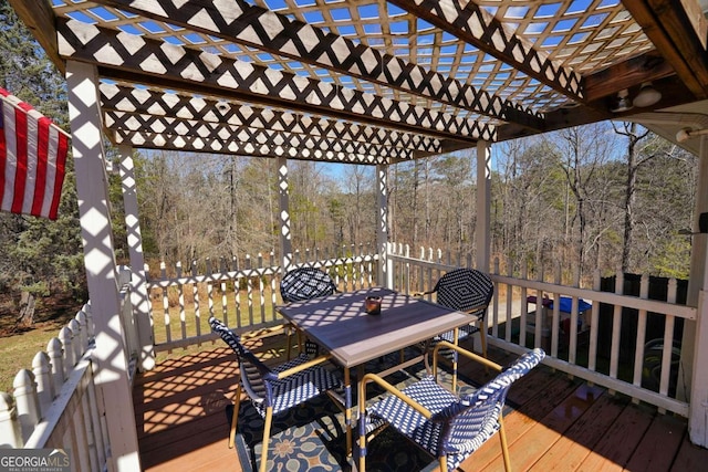 wooden deck featuring a pergola