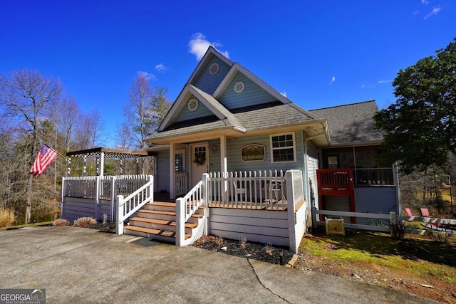 view of front of home featuring covered porch