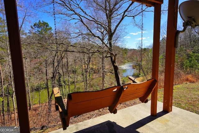 exterior space with a water view