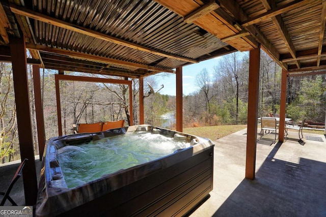 view of patio / terrace featuring a hot tub