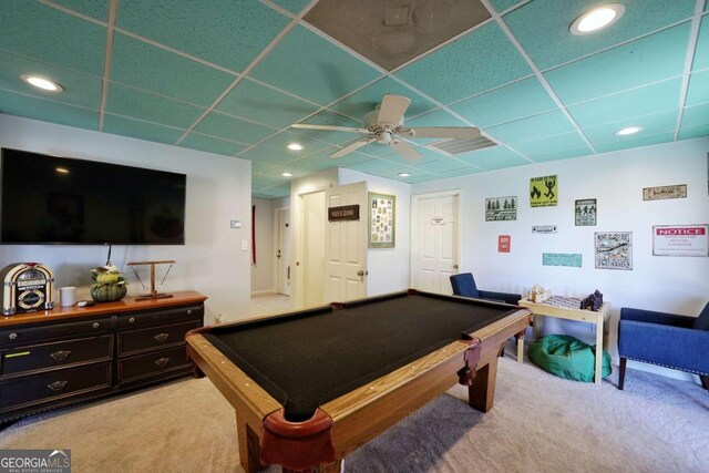 recreation room featuring light carpet, a paneled ceiling, ceiling fan, and pool table