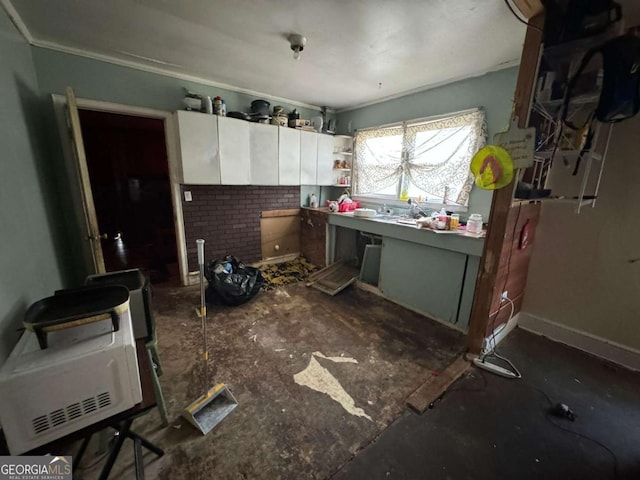 kitchen featuring white cabinets