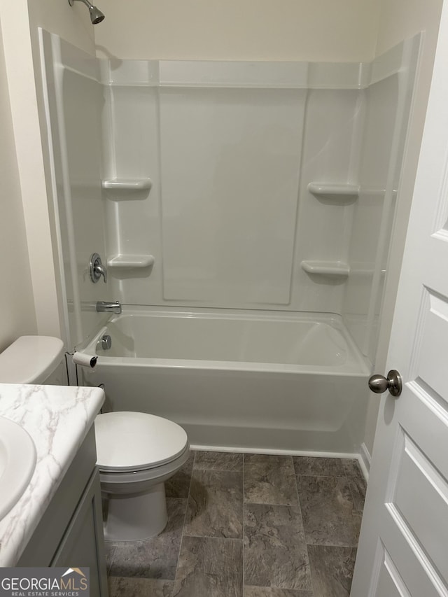 full bathroom featuring vanity, toilet, and shower / washtub combination