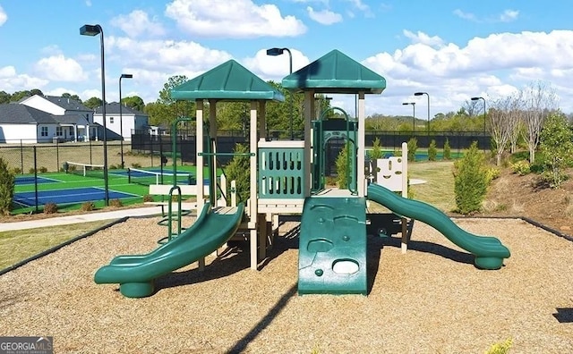 view of playground featuring tennis court