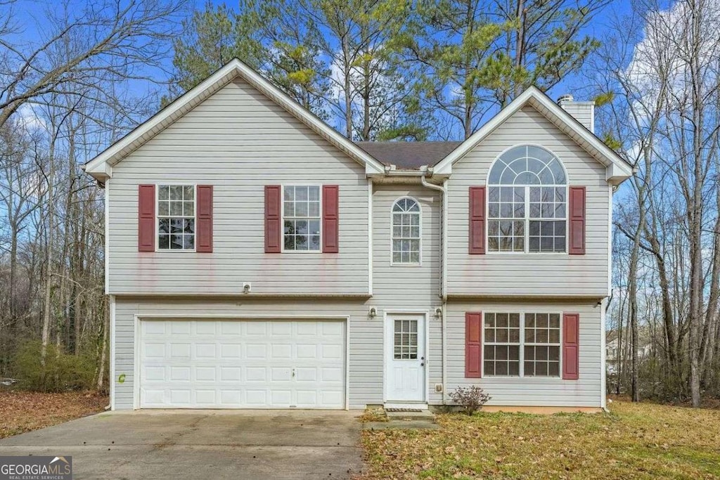 6207 Willowbrook Dr, Riverdale, GA 30296 - view of front of home with a garage