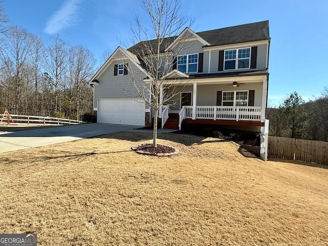 view of front of property with a porch and a garage